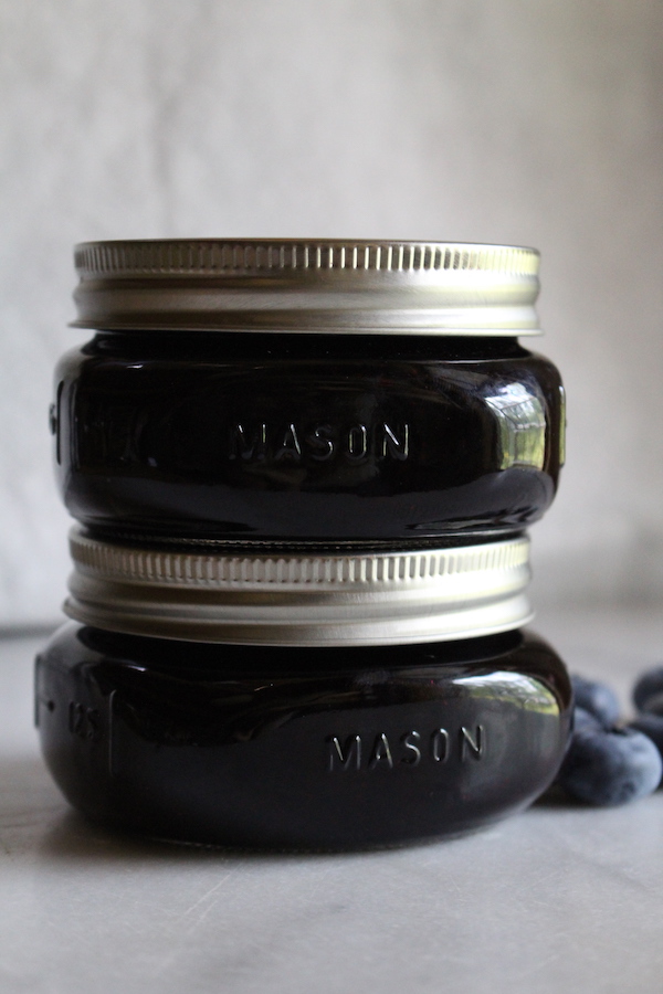 Canning blueberry jam in mason jars