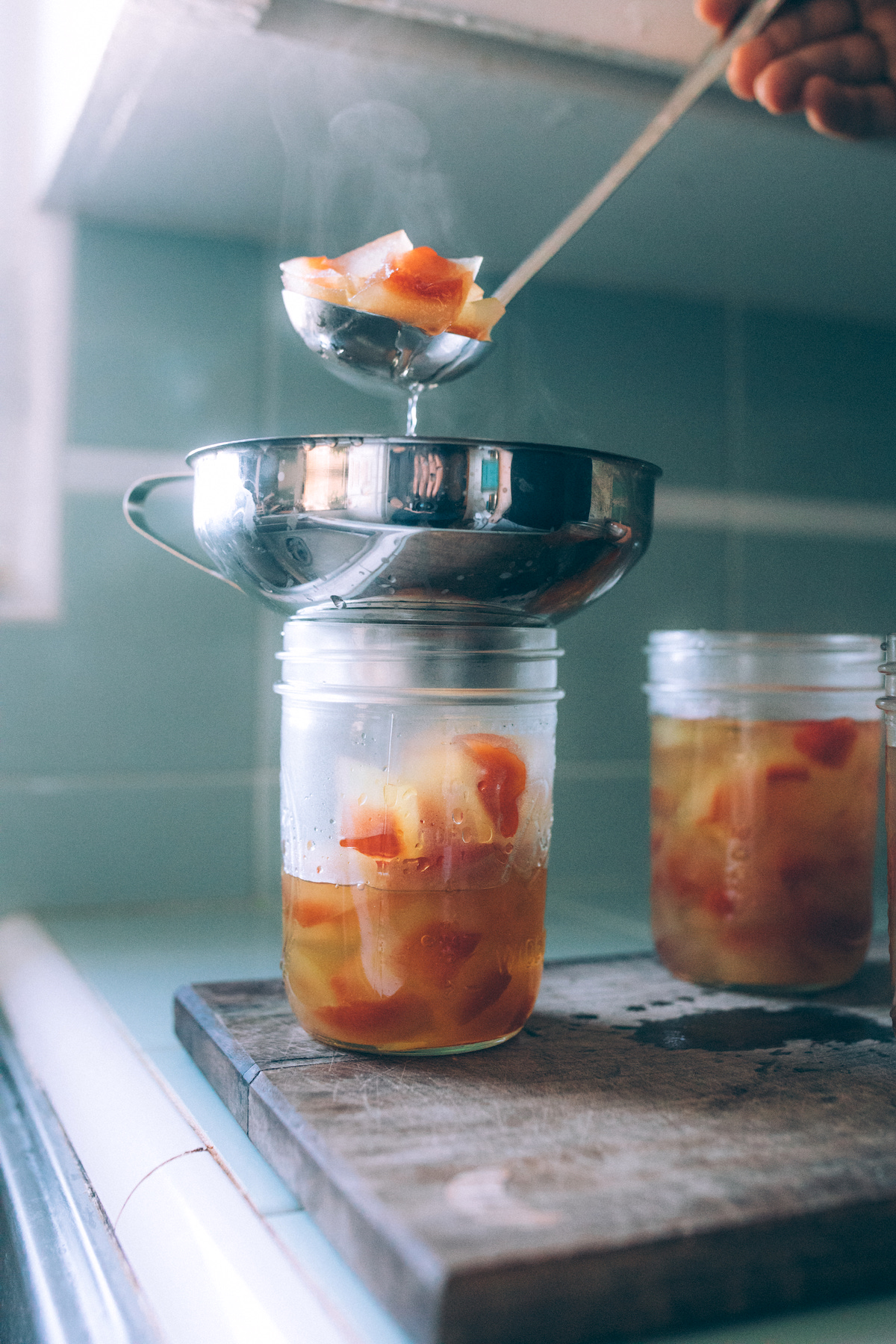 Filling Jars with Watermelon Rind Pickles