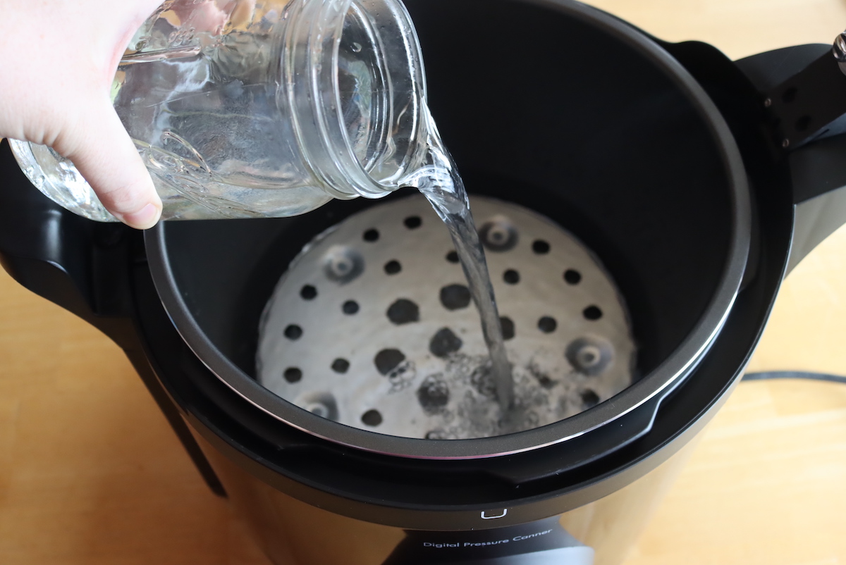 Presto Precise Digital Pressure Canner filling with water
