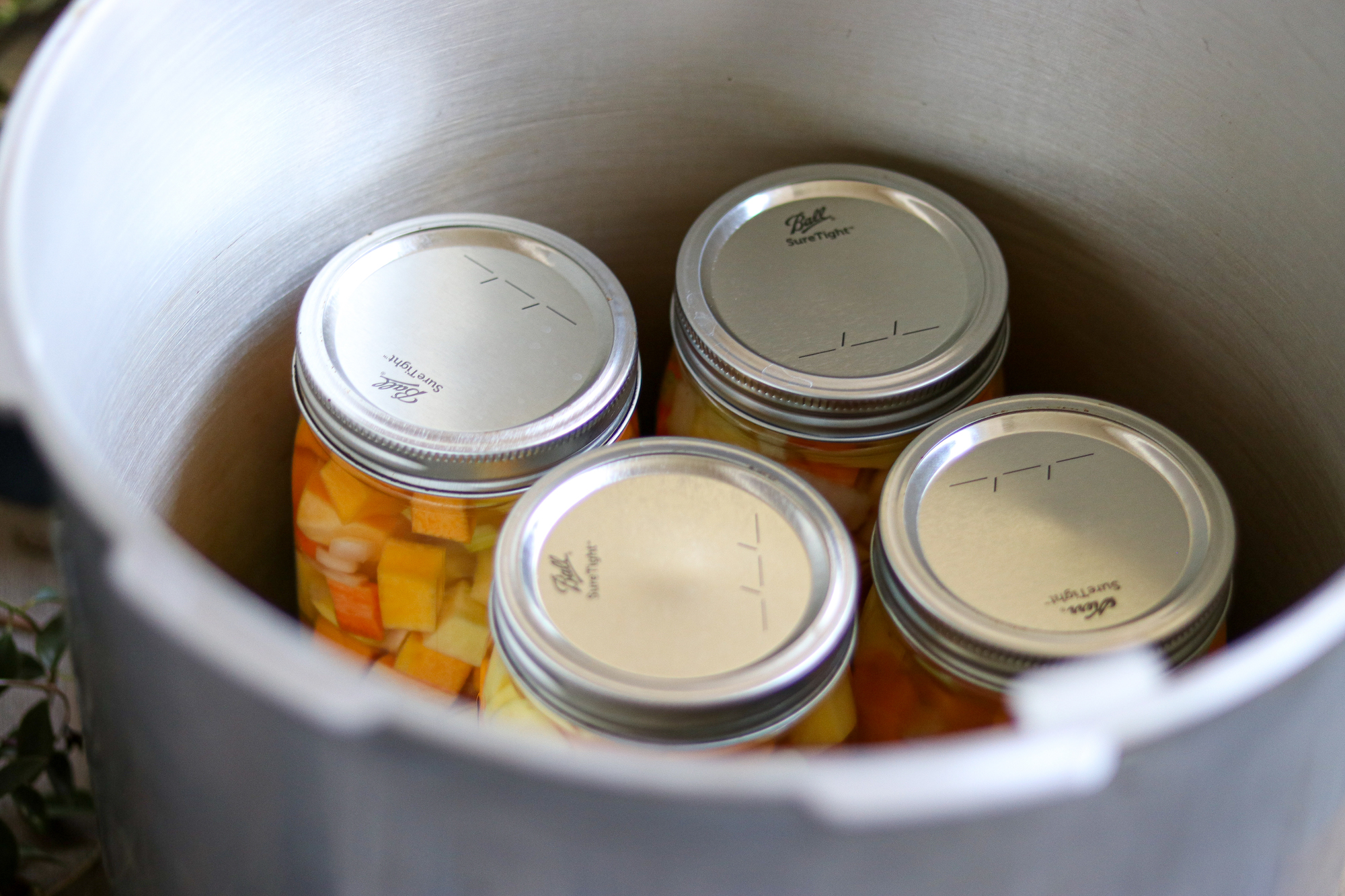 Filling Jars with Butternut Squash Soup Base