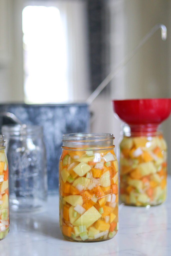 Filling Jars with Butternut Squash Soup Base