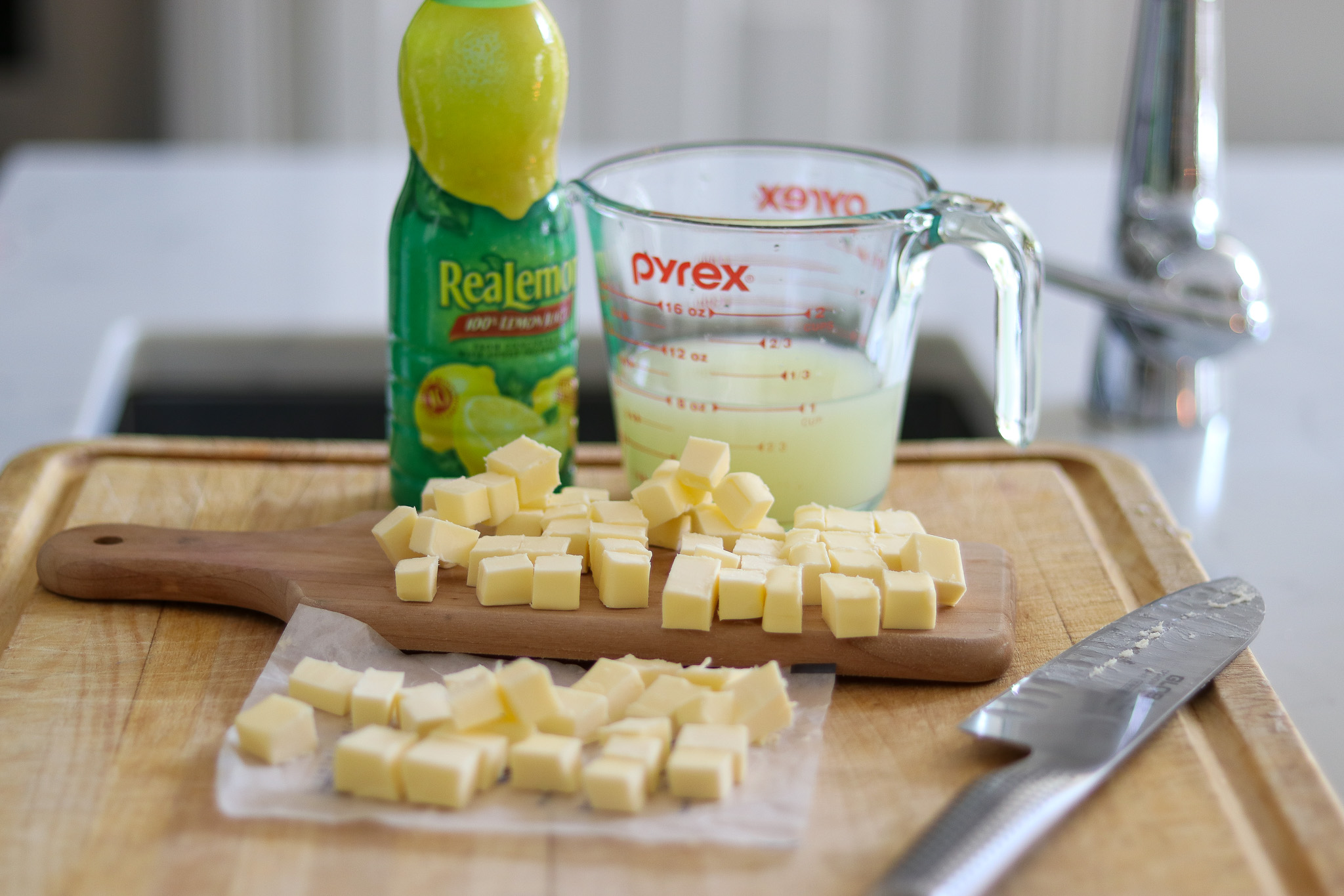 Butter Pieces and Lemon Juice for Lemon Curd