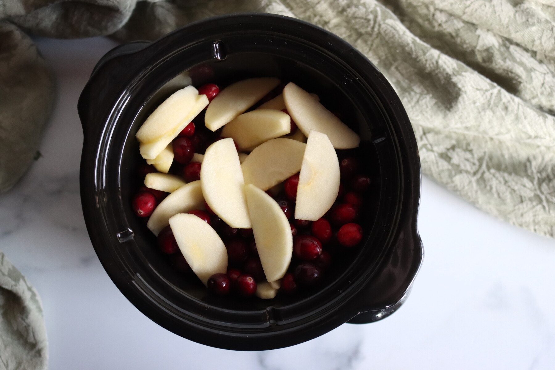Making Cranberry Applesauce in a crock pot