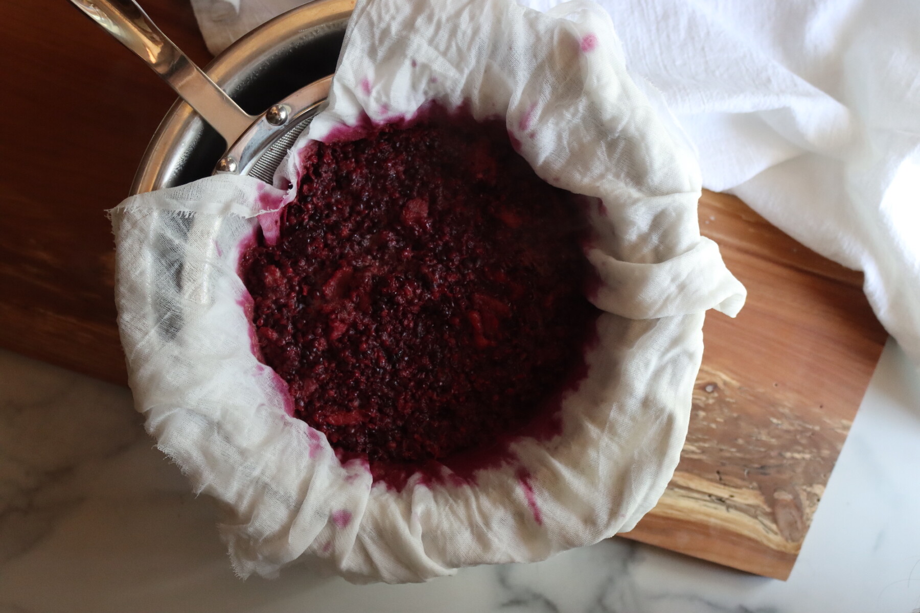 Straining Blackberry Fruit for Jelly