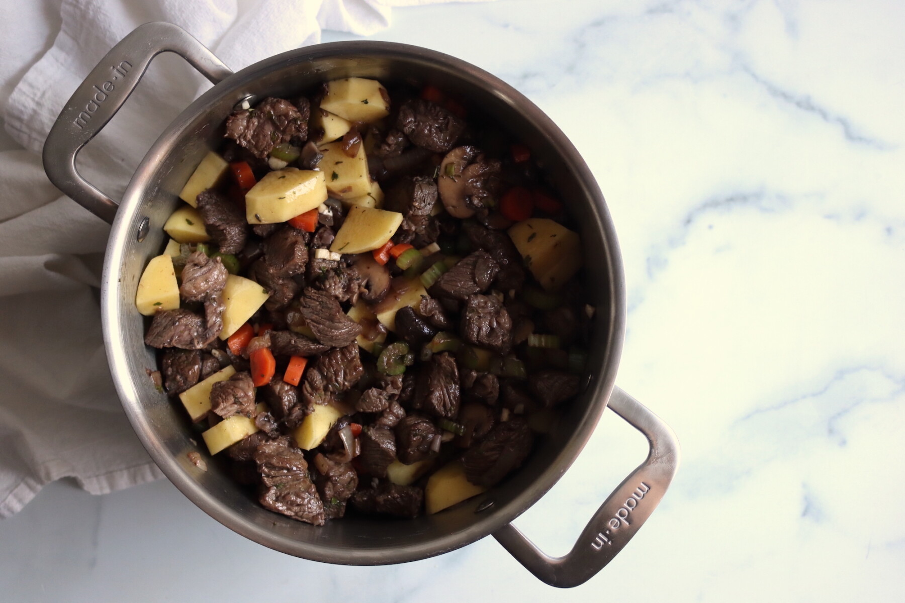 Cooking Beef Stew with Mushrooms