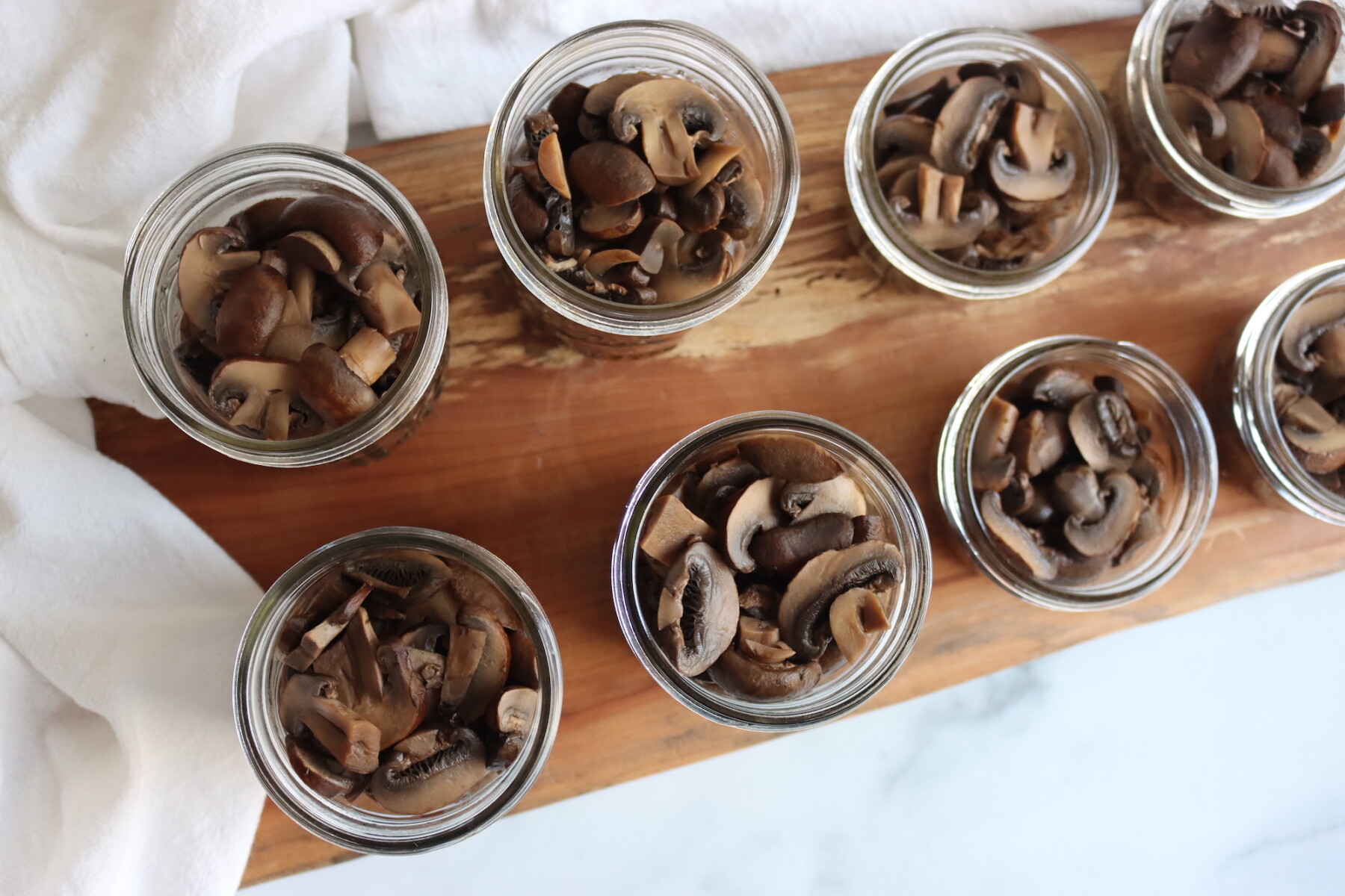 Filling Jars for canning mushrooms