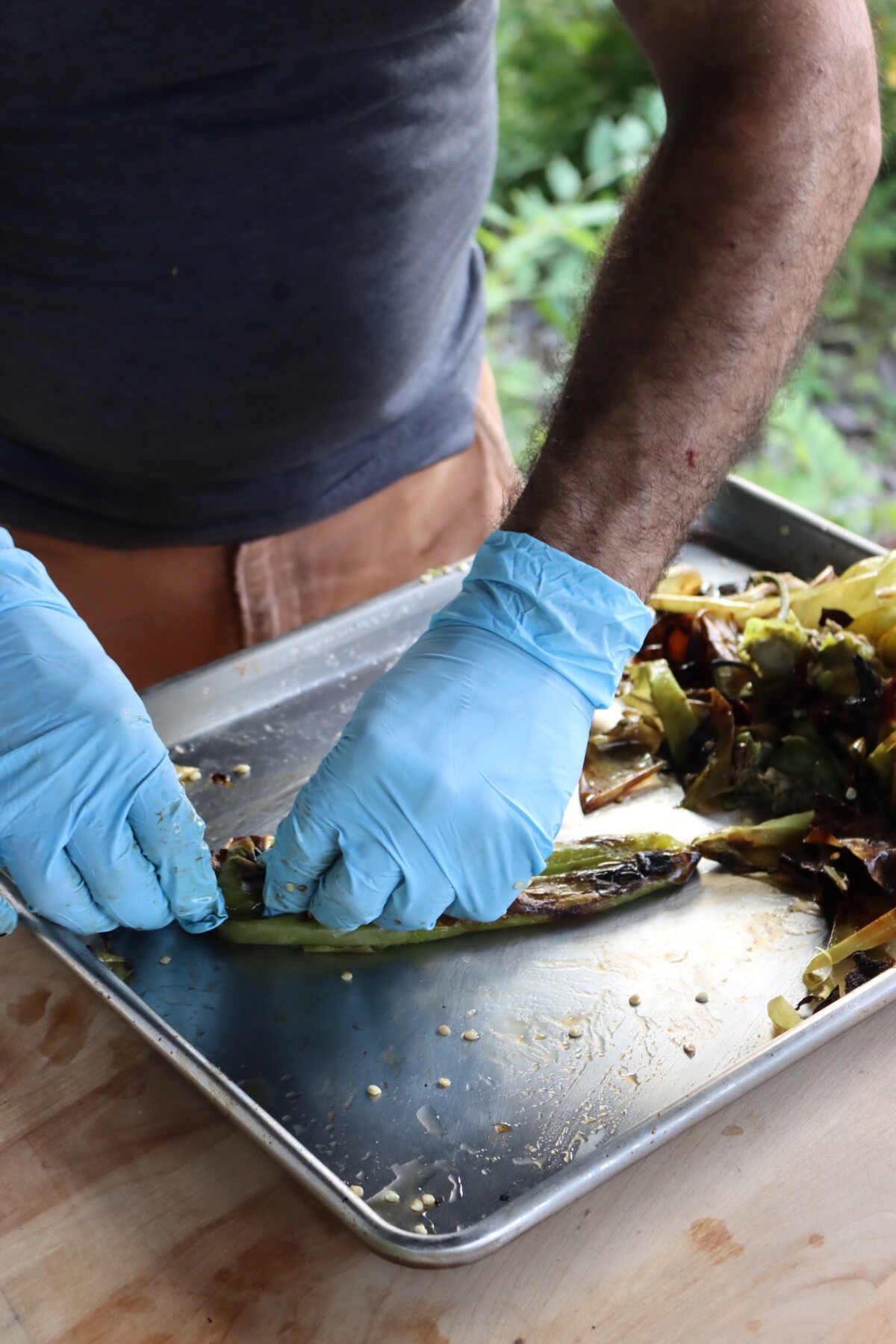 Peeling Roasted Hatch Chilis