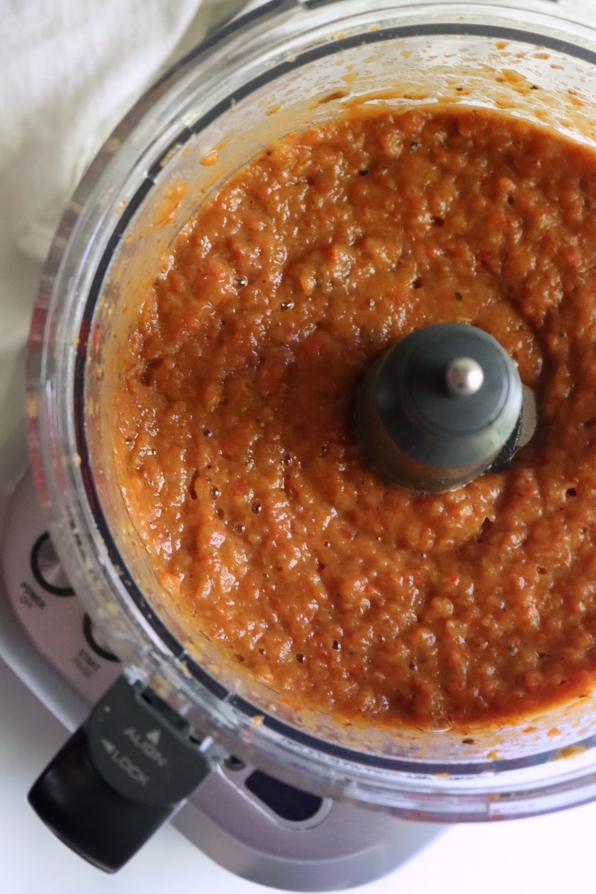 Roasted peppers and eggplant pureed into ajvar in a food processor